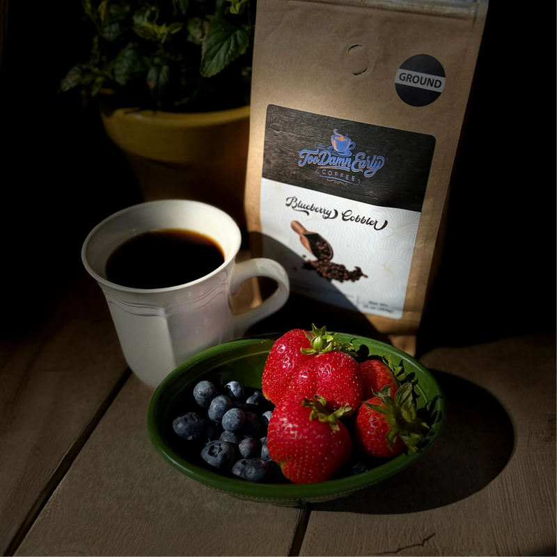 A fresh cup of Too Damn Early coffee, still steaming